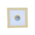 Cross-stitched design on fabric with a beige frame on a white background