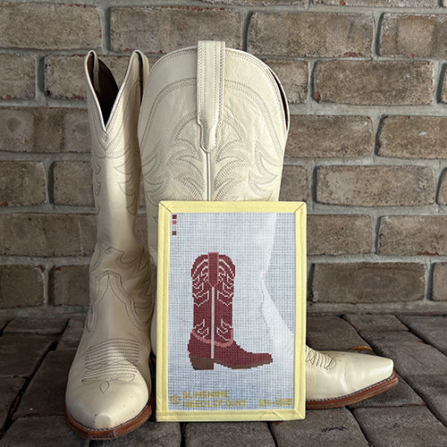 Red boot canvas with white boots backdrop