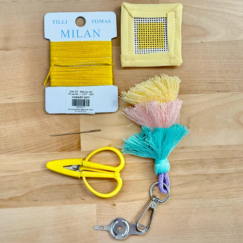 Small canvas with thread and scissors